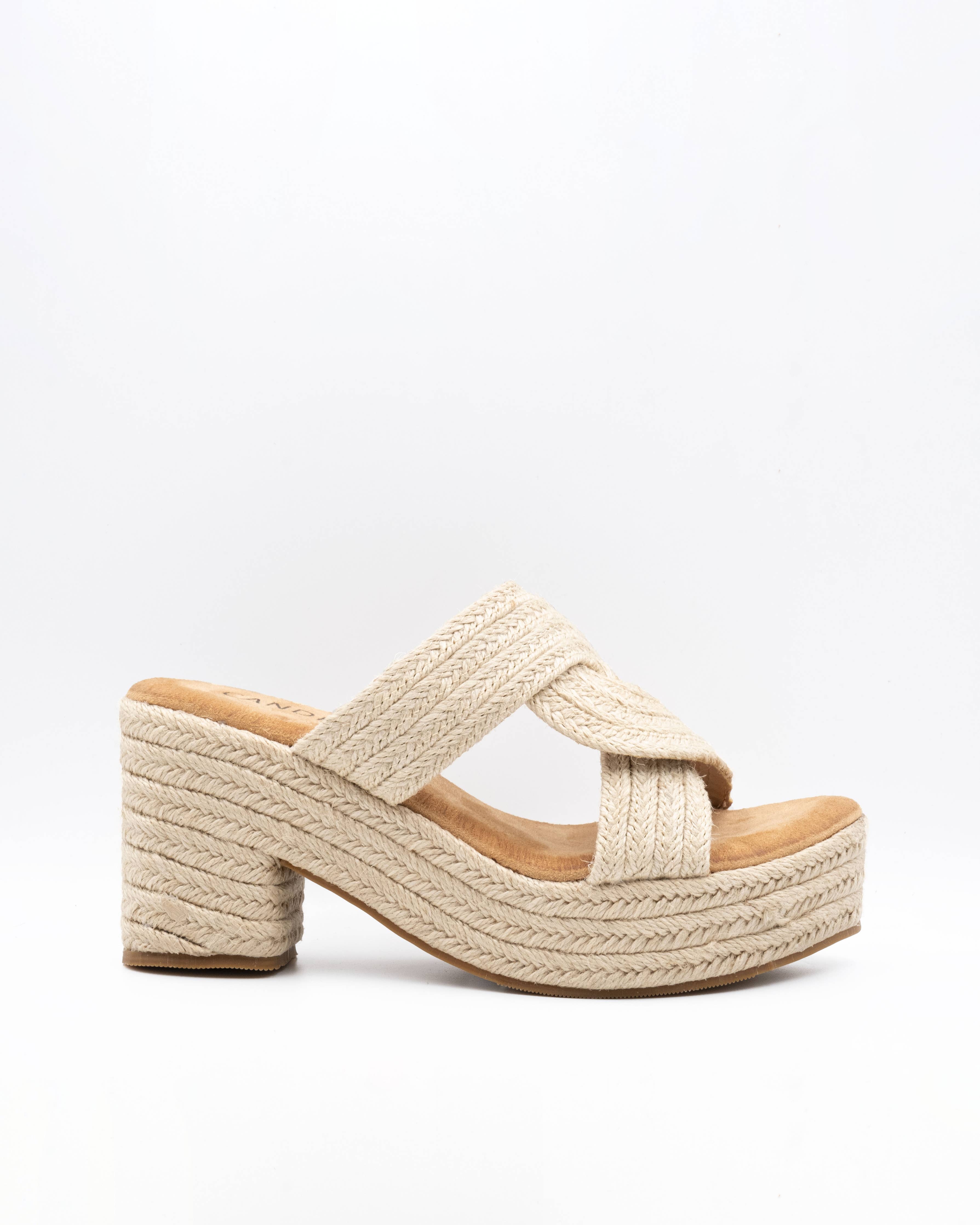 Platform heeled sandals with round crossed straps