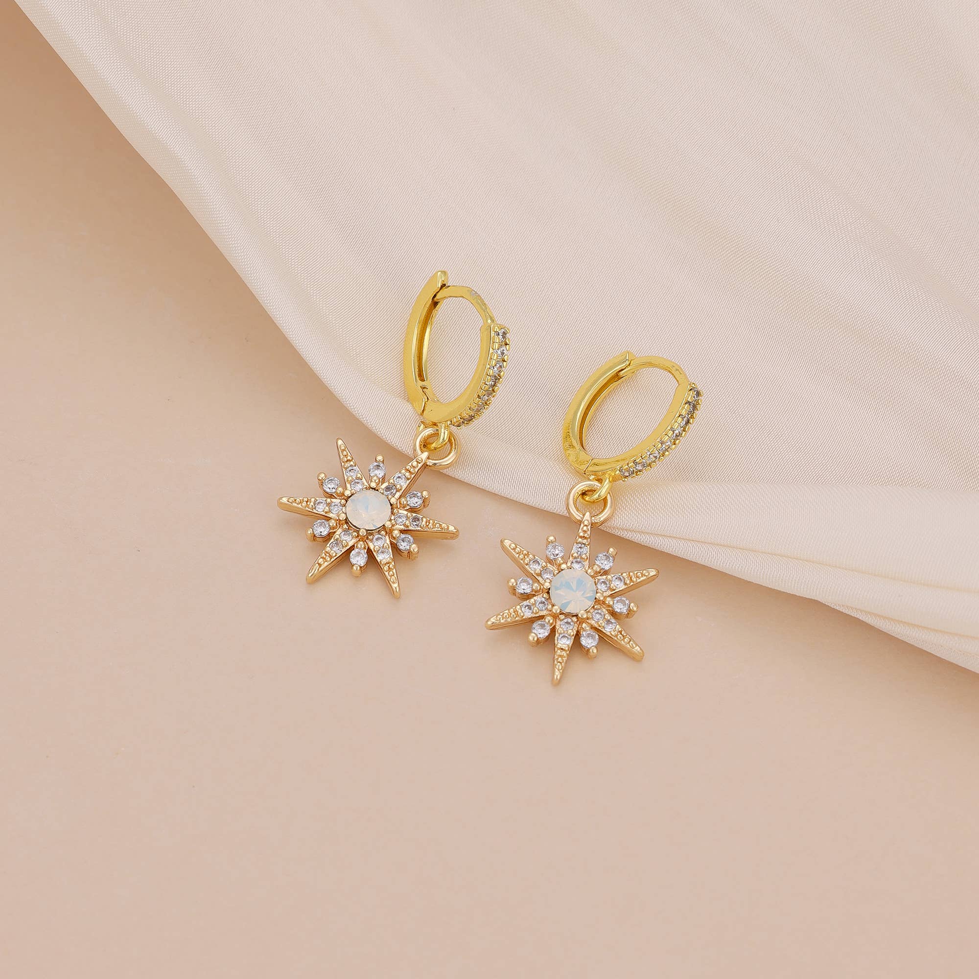 Star Huggie earrings