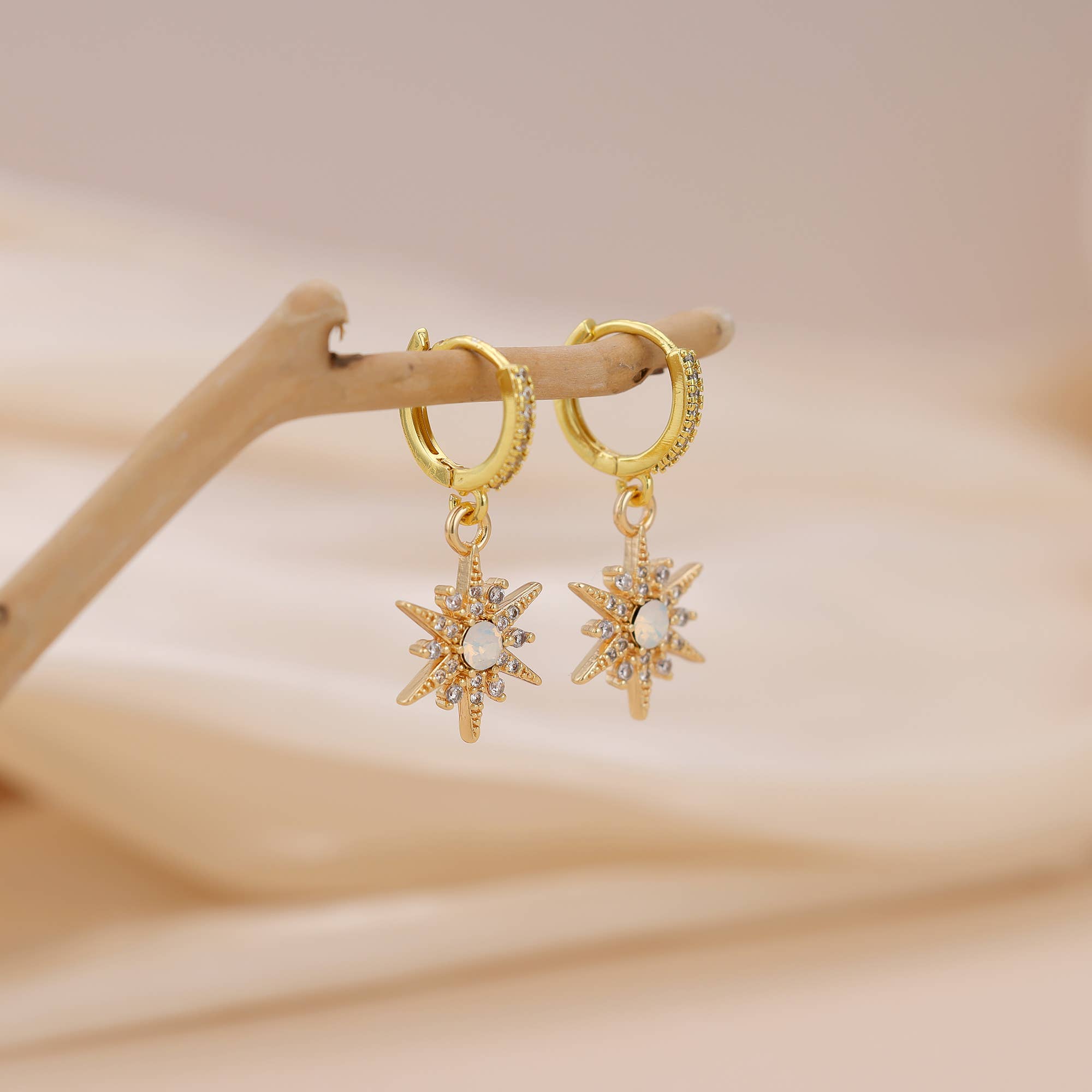 Star Huggie earrings